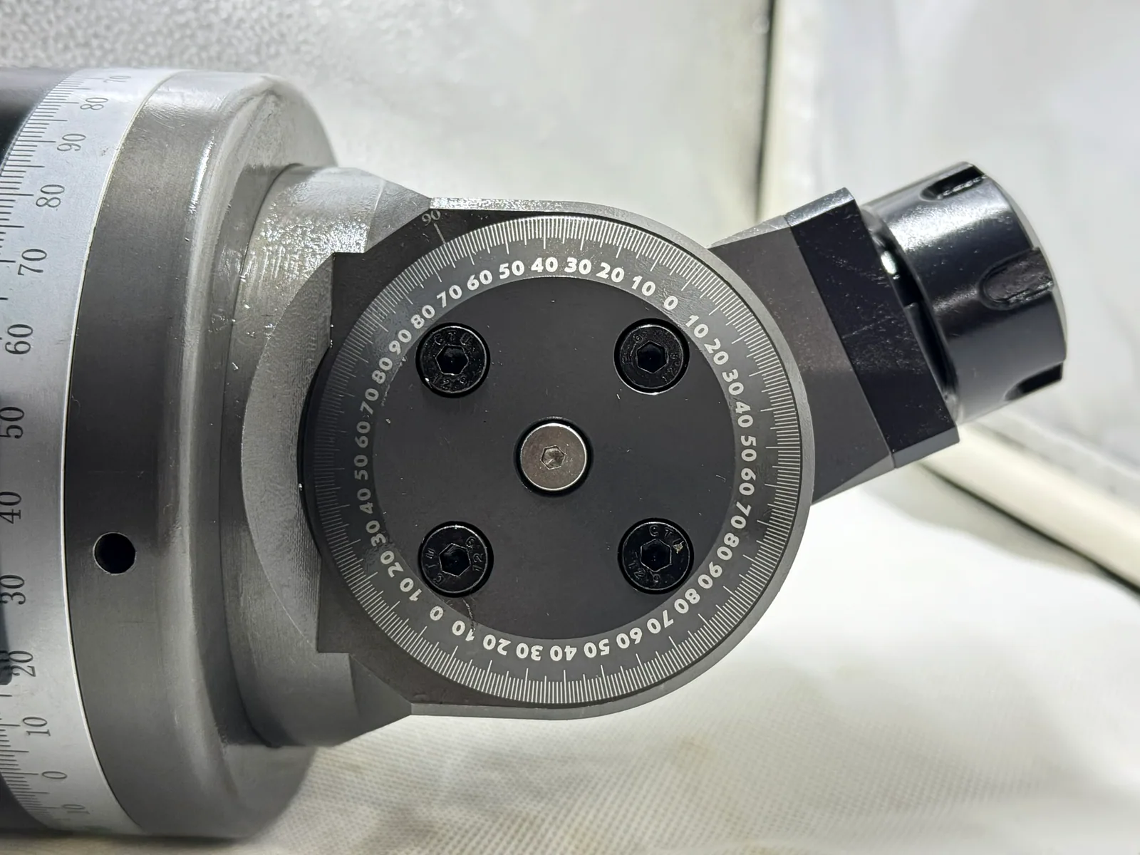 Close-up of the graduated angle scale on a Mongtec angle head