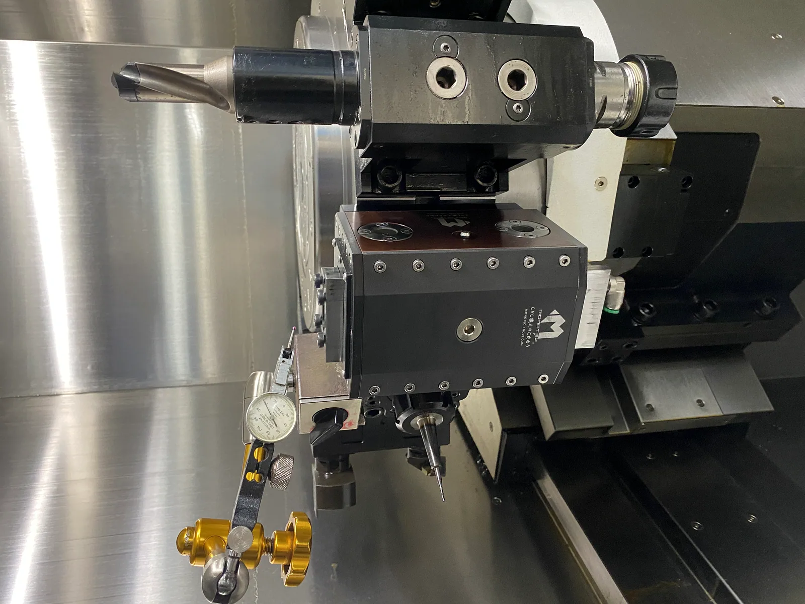 Mongtec broaching unit on a lathe turret with dial indicator set up