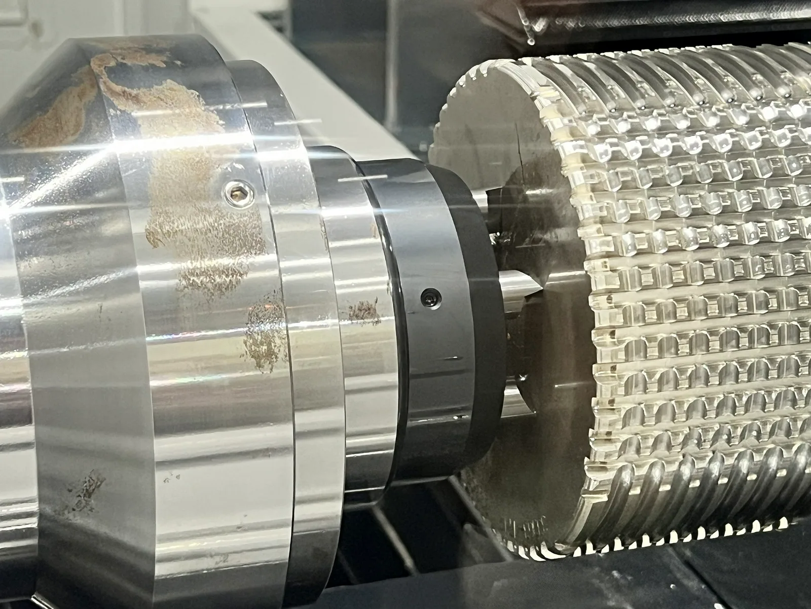 A Mongtec face driver driving a gear blank during turning