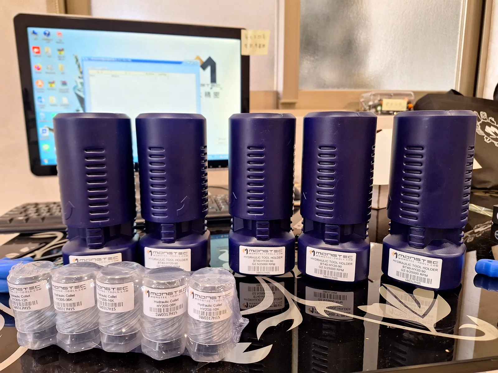 A batch of Mongtec hydraulic tool holders with inspection records